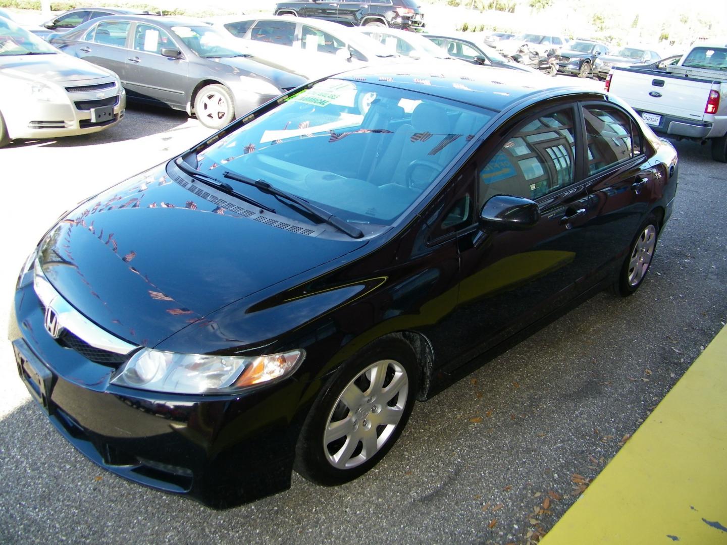 2011 Black /Gray Honda Civic LX Sedan 5-Speed AT (19XFA1F5XBE) with an 1.8L L4 SOHC 16V engine, 5-Speed Automatic transmission, located at 4000 Bee Ridge Road, Sarasota, FL, 34233, (941) 926-0300, 27.298664, -82.489151 - Photo#0